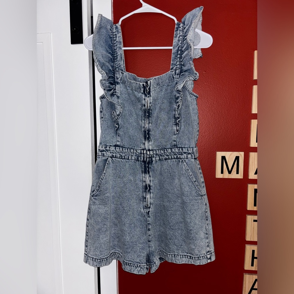 Blue Distressed Denim Jumpsuit with Vintage Aesthetic